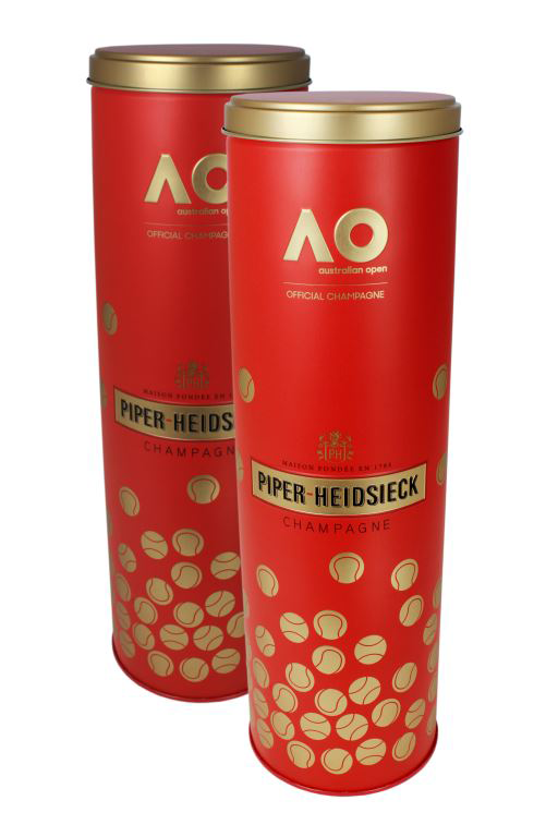 Piper-Heidsieck Champagne Chooses Premium Metal Packaging to Celebrate Excellence and Sportsmanship at the Australian Open Two tall and skinny cylindrical Red and gold luxury packaging tins of champagne