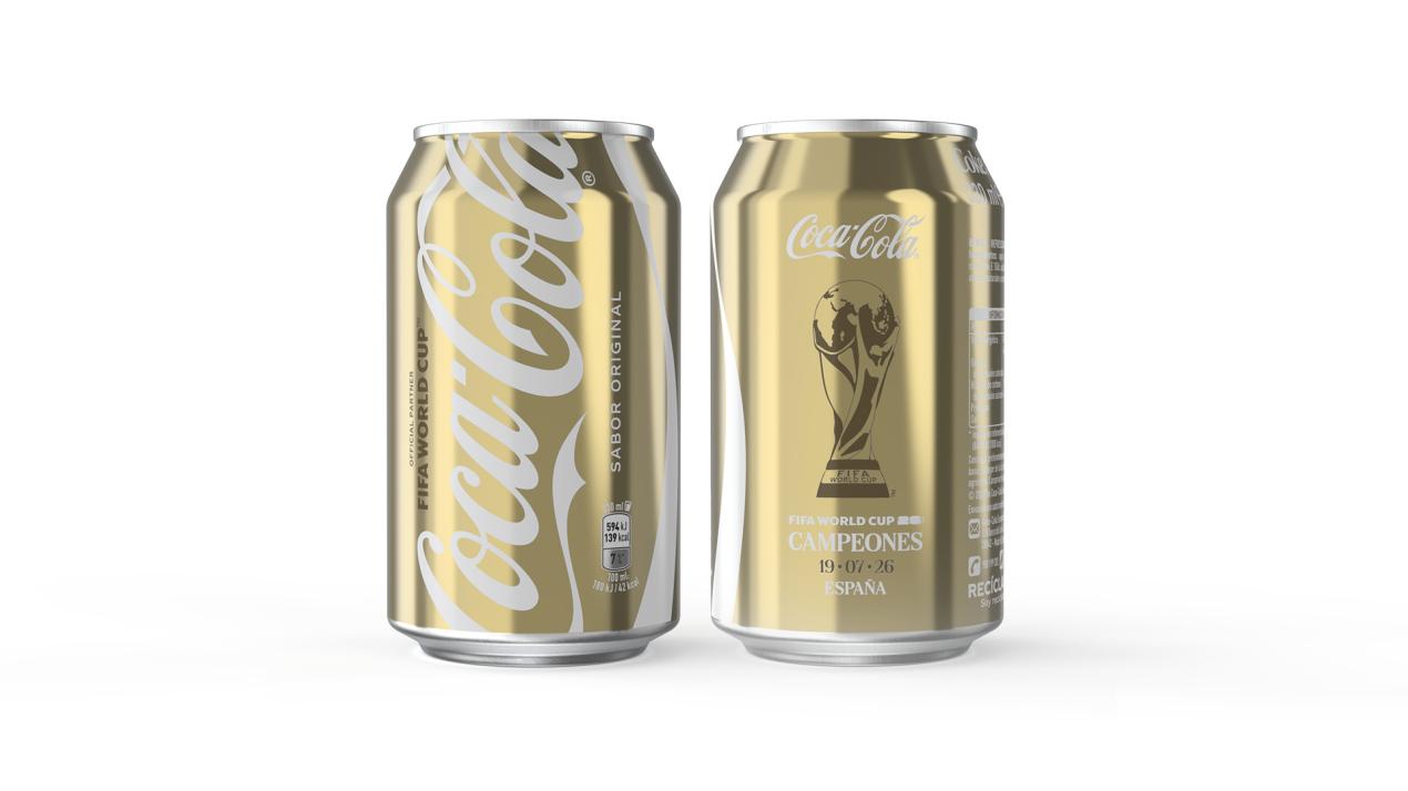 Front and back views of a limited-edition gold Coca-Cola can featuring the FIFA World Cup trophy and Spain champions design.