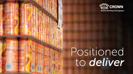 Close-up of stacked orange beverage cans on a production line, with a blurred background of more cans. On the right, white text reads “Positioned to deliver,” alongside the Crown logo and the words “Annual Shareholders Meeting, April 30, 2026."