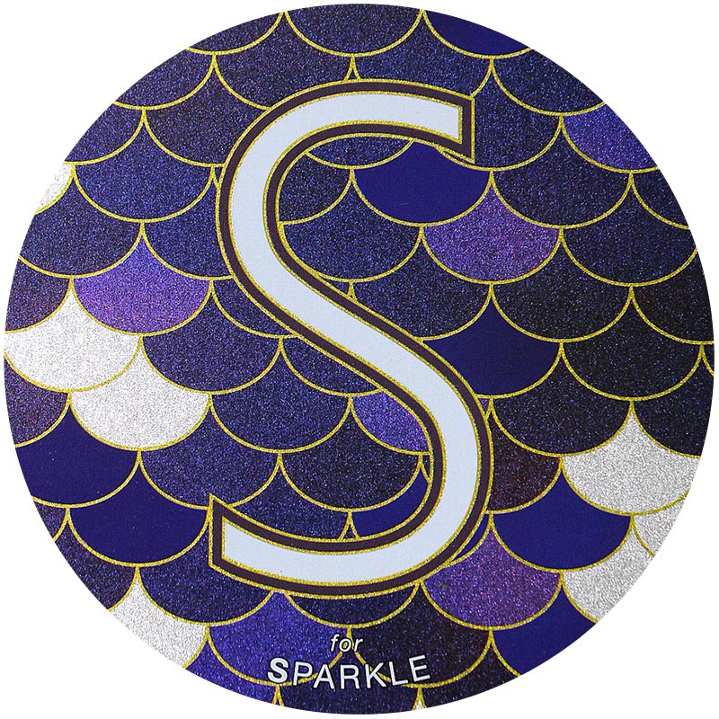 Sparkle-2x.jpeg A sparkling finish depicting a capital "S" in white font, outlined by black and shiny gold against a fish scale background. The fish scales are colored white, purple, black, and gold.