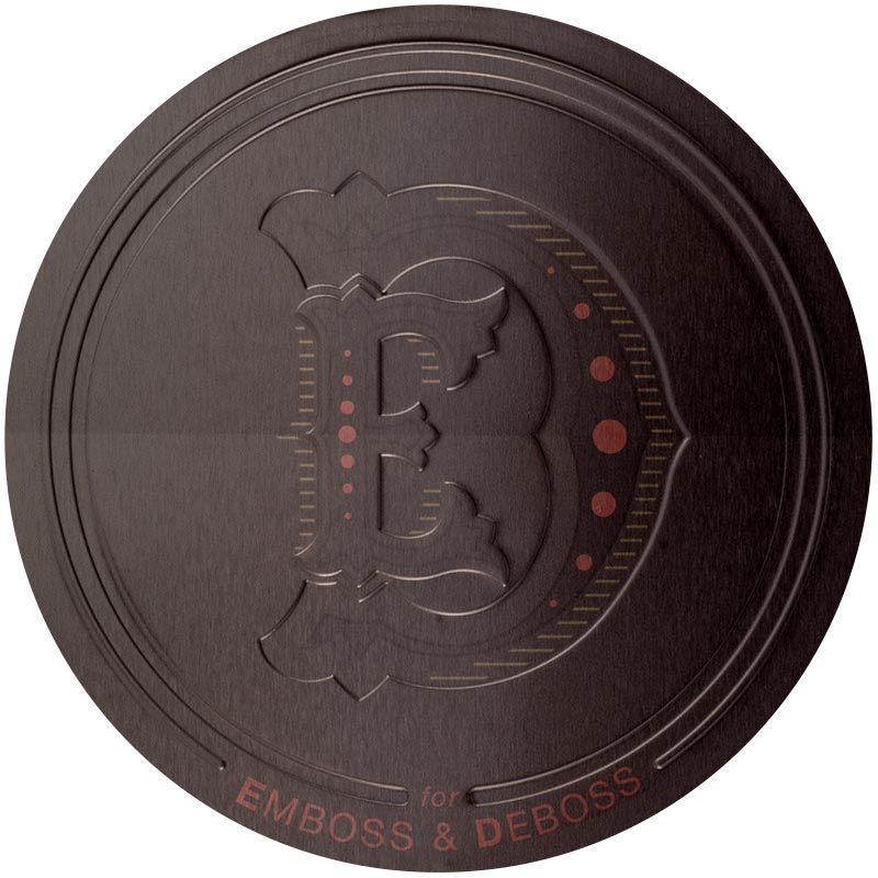 Emboss-&-Deboss-2x.jpeg A tin lid with the letters "E" and "D" engraved into it in a gothic font. The tin reads: "E & D for Emboss & Deboss"