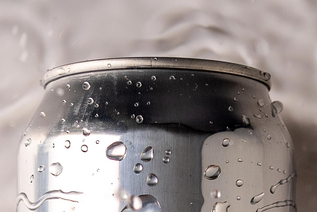 top of blank can, that has wet dew spots