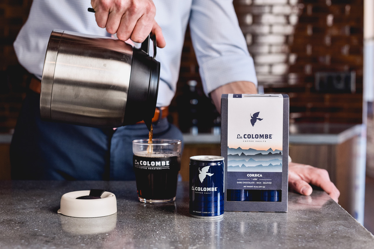 Colombe Coffee man pours cup of La Colombe coffee