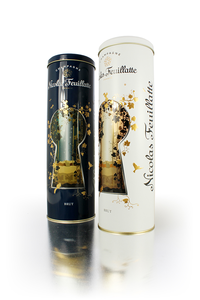 Crown Helps Nicolas Feuillatte Enthusiasts Enter "The Enchanted Land" Two tall tins, one black and the other white, with Nicolas Feuillatte written on the site