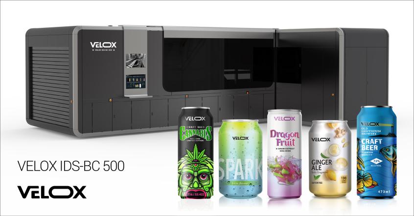 The product image for the Velox IDS-BC 500 placed behind an assortment of different colorful beverage cans.