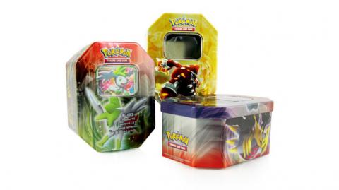 A collection of Pokémon branded tins, with windows cut out of the lid to allow viewing of the cards inside.